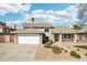 Charming two-story home with a well-manicured front yard and a two-car garage in a suburban neighborhood at 2770 W Kent Dr, Chandler, AZ 85224