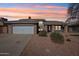 Charming single-story home featuring a well-maintained front yard and two-car garage at 2770 W Kent Dr, Chandler, AZ 85224