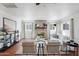 Comfortable living room featuring a brick fireplace and tile floors, bathed in natural light at 2770 W Kent Dr, Chandler, AZ 85224