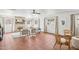 Open living room with tile flooring, a brick fireplace, and cozy seating arrangement at 2770 W Kent Dr, Chandler, AZ 85224