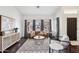 Stylish living room featuring hardwood floors, a comfortable sofa, and natural light at 2770 W Kent Dr, Chandler, AZ 85224