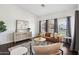 Stylish living room featuring hardwood floors, a comfortable sofa, and natural light at 2770 W Kent Dr, Chandler, AZ 85224