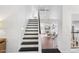 Bright foyer with stairway leading to the second floor with an adjoining living room at 2770 W Kent Dr, Chandler, AZ 85224