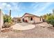 Expansive backyard with patio, desert landscaping and an inground pool at 3060 W Roberta Dr, Phoenix, AZ 85083