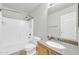 Modern bathroom with shower-tub and updated fixtures at 3060 W Roberta Dr, Phoenix, AZ 85083