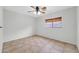 Empty bedroom with tile floor and ample natural light at 3060 W Roberta Dr, Phoenix, AZ 85083