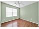 Cozy bedroom with wood floors and natural light at 3060 W Roberta Dr, Phoenix, AZ 85083