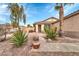 Inviting entryway featuring a paver walkway and desert landscaping with mature cactus and shade trees at 3060 W Roberta Dr, Phoenix, AZ 85083