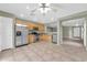Well-lit kitchen with stainless steel appliances and tile flooring at 3060 W Roberta Dr, Phoenix, AZ 85083