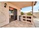 Covered outdoor patio with built in bar and access to backyard at 3060 W Roberta Dr, Phoenix, AZ 85083