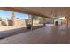 Large covered back patio perfect for outdoor entertaining with a ceiling fan at 3238 E Cholla St, Phoenix, AZ 85028