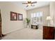 Spacious bedroom with shuttered windows, carpet flooring and neutral colored walls at 34242 N 10Th St, Phoenix, AZ 85085