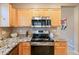 Kitchen featuring stainless steel appliances and granite countertops at 40746 N Boone Ln, Anthem, AZ 85086