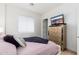 Bright bedroom boasts hardwood floors and a wall-mounted TV at 4438 N 27Th St # 24, Phoenix, AZ 85016