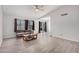 Bright living room featuring large windows and sliding glass doors to the backyard at 4611 N 75Th Dr, Phoenix, AZ 85033