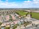 Aerial view of a suburban neighborhood with well-manicured lawns and community green spaces at 5172 S Seton Ave, Gilbert, AZ 85298