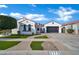 Charming single-story home with desert landscaping, a spacious driveway, and a welcoming facade at 5172 S Seton Ave, Gilbert, AZ 85298