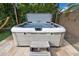 Inviting in-ground hot tub surrounded by lush greenery, creating a private and serene oasis at 5172 S Seton Ave, Gilbert, AZ 85298