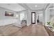 Inviting living area with hardwood floors, built-in cabinets, and plenty of natural light at 5172 S Seton Ave, Gilbert, AZ 85298