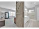 View from the bedroom of the bathroom with double vanity and glass door shower at 5172 S Seton Ave, Gilbert, AZ 85298