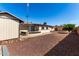 Wide backyard featuring minimal landscaping, providing a blank canvas for creativity and personalization at 6409 E Duncan St, Mesa, AZ 85205
