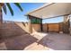 Back patio area with decorative brickwork, providing an inviting space for outdoor relaxation at 6409 E Duncan St, Mesa, AZ 85205