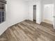 This bedroom is equipped with a sizable closet and a large window at 7009 W Lincoln St, Peoria, AZ 85345