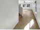 Inviting entryway with stairs, vinyl flooring, and an open view to the spacious living area at 7009 W Lincoln St, Peoria, AZ 85345