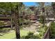 Expansive courtyard with water features and putting green among the palm trees and beautiful condo buildings at 7147 E Rancho Vista Dr # 4007, Scottsdale, AZ 85251