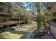 Breathtaking exterior view of beautiful complex featuring ponds, putting green and palm trees surrounding condos at 7147 E Rancho Vista Dr # 4007, Scottsdale, AZ 85251