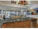 Kitchen with granite counters and stainless dishwasher overlooking the living area at 7147 E Rancho Vista Dr # 4007, Scottsdale, AZ 85251