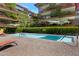 Community pool with lounge chairs at this luxury condominium property at 7147 E Rancho Vista Dr # 4007, Scottsdale, AZ 85251