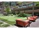 Seating area in the patio with a view of the putting green at this luxury condominium at 7147 E Rancho Vista Dr # 4007, Scottsdale, AZ 85251