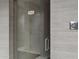 Modern steam room with a glass door and tile surround at 7147 E Rancho Vista Dr # 4007, Scottsdale, AZ 85251
