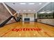 Indoor basketball court with hardwood floors, basketball hoops, and viewing area at 7157 E Rancho Vista Dr # 6011, Scottsdale, AZ 85251