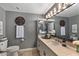 The bright bathroom includes a large mirror, ample vanity space, and modern fixtures at 7157 E Rancho Vista Dr # 6011, Scottsdale, AZ 85251