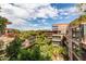 The beautifully landscaped condominium complex features multiple stories and rooftop gardens at 7157 E Rancho Vista Dr # 6011, Scottsdale, AZ 85251