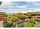 Exterior shot of luxury condo building showing verdant landscaping, and rooftop gardens at 7157 E Rancho Vista Dr # 6011, Scottsdale, AZ 85251