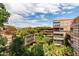 Beautiful exterior view of the condominium complex with lush greenery, and manicured trees at 7157 E Rancho Vista Dr # 6011, Scottsdale, AZ 85251