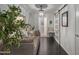 Cozy hallway featuring a daybed, chandelier, and a decorative barn door at 7157 E Rancho Vista Dr # 6011, Scottsdale, AZ 85251