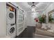 Practical laundry room with stacked washer/dryer and additional seating at 7157 E Rancho Vista Dr # 6011, Scottsdale, AZ 85251