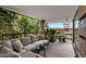 Relaxing outdoor patio with comfortable seating and lush greenery in a luxurious setting at 7157 E Rancho Vista Dr # 6011, Scottsdale, AZ 85251