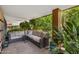 A luxurious patio is complemented by trees, foliage, a seating area, and an exquisite view at 7157 E Rancho Vista Dr # 6011, Scottsdale, AZ 85251