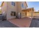 Back of the house, covered patio, outdoor kitchen, and a low maintenance landscape at 7830 S 26Th St, Phoenix, AZ 85042