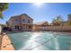 Expansive backyard featuring a covered pool and a covered patio, perfect for entertaining at 7830 S 26Th St, Phoenix, AZ 85042