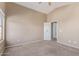 Carpeted bedroom features high ceilings and is freshly painted at 7830 S 26Th St, Phoenix, AZ 85042