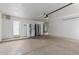 Spacious garage with a refrigerator and water heater for added convenience and storage at 7830 S 26Th St, Phoenix, AZ 85042