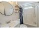 This bathroom is equipped with a shower and vanity at 9709 E Empress Ave, Mesa, AZ 85208