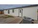 This home features a well maintained exterior and patio space with access to utilities at 9709 E Empress Ave, Mesa, AZ 85208