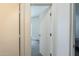 View of a bedroom through a doorway from the hallway at 9709 E Empress Ave, Mesa, AZ 85208